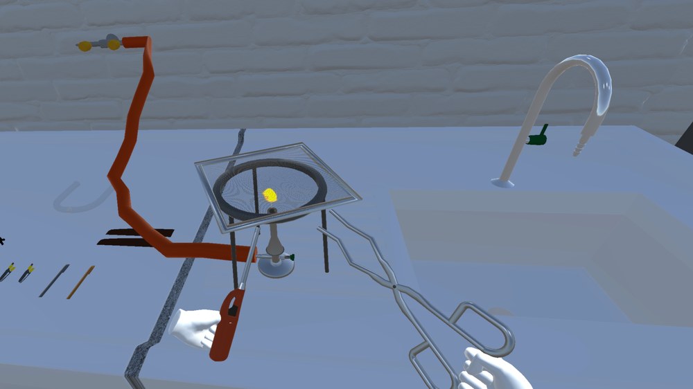 Burner.jpg Die VR-Umgebung zeigt, wie zwei virtuelle Hände an einer Küchenzeile einen Gasbrenner anmachen.